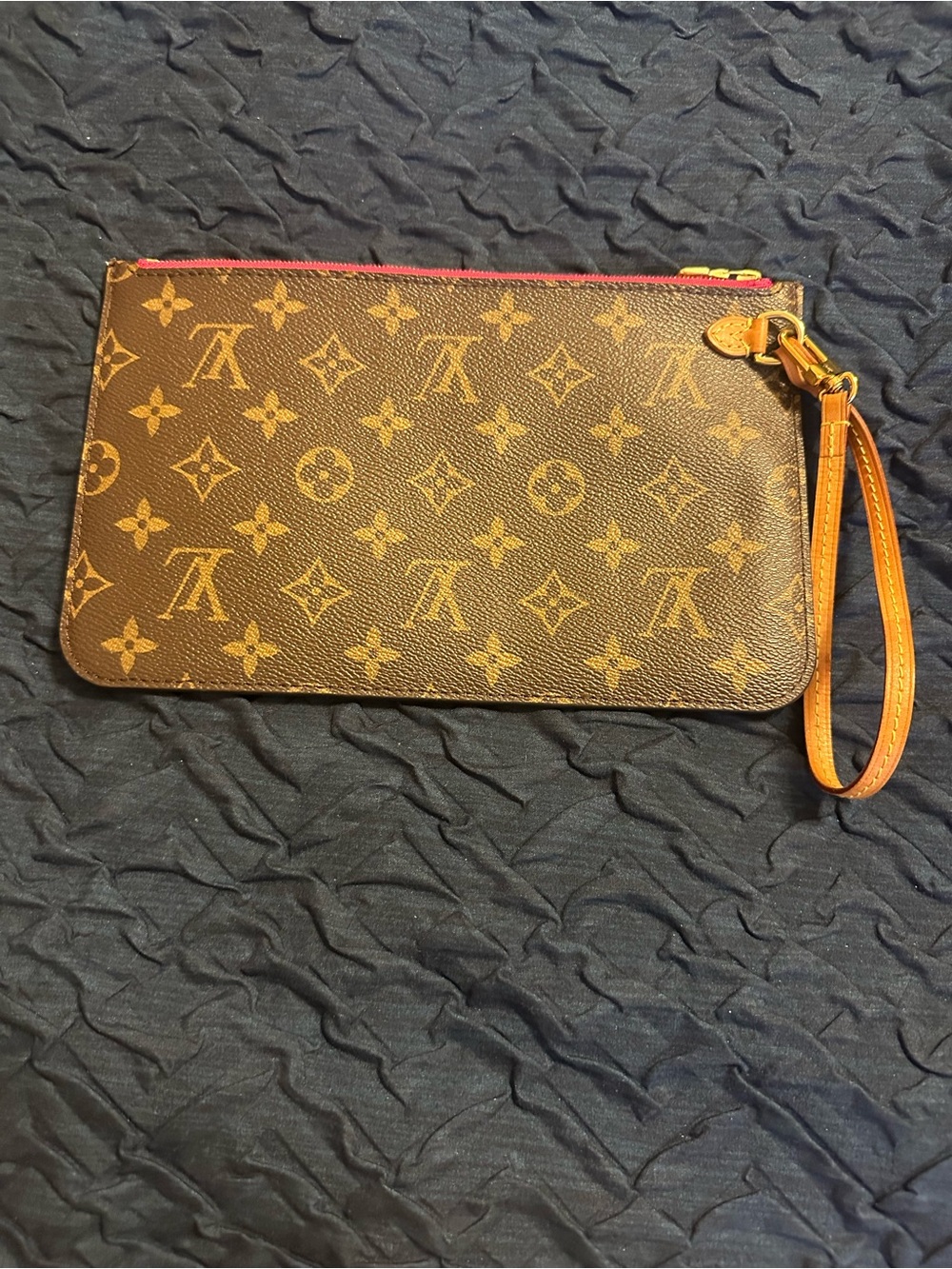 Authentic Louis Vuitton monogram wristlet with pink interior!